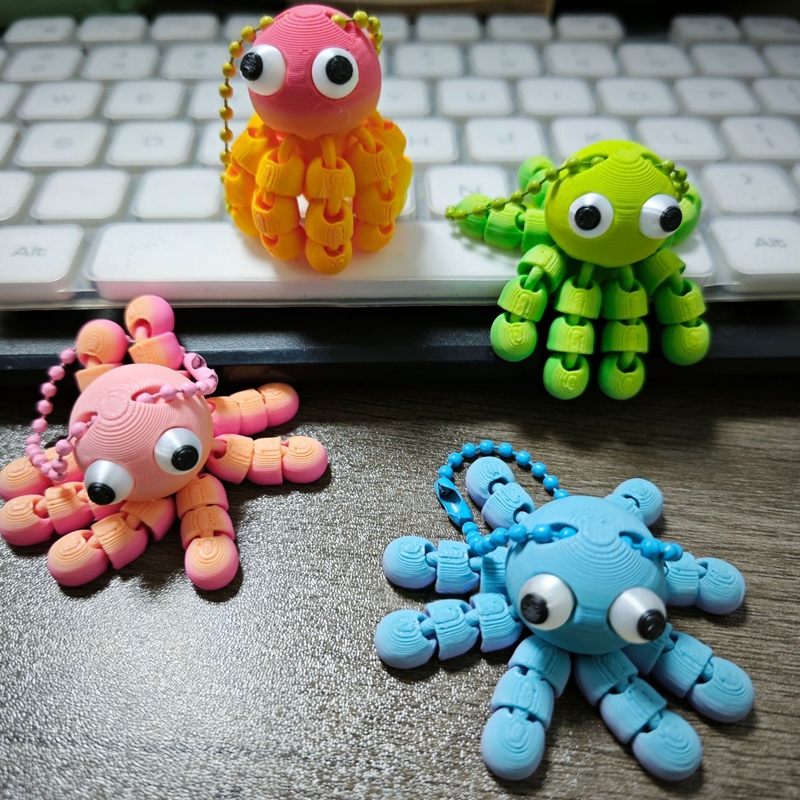 3D Printed Articulated Octopus - огляд і ціна 3D Printing Keychain